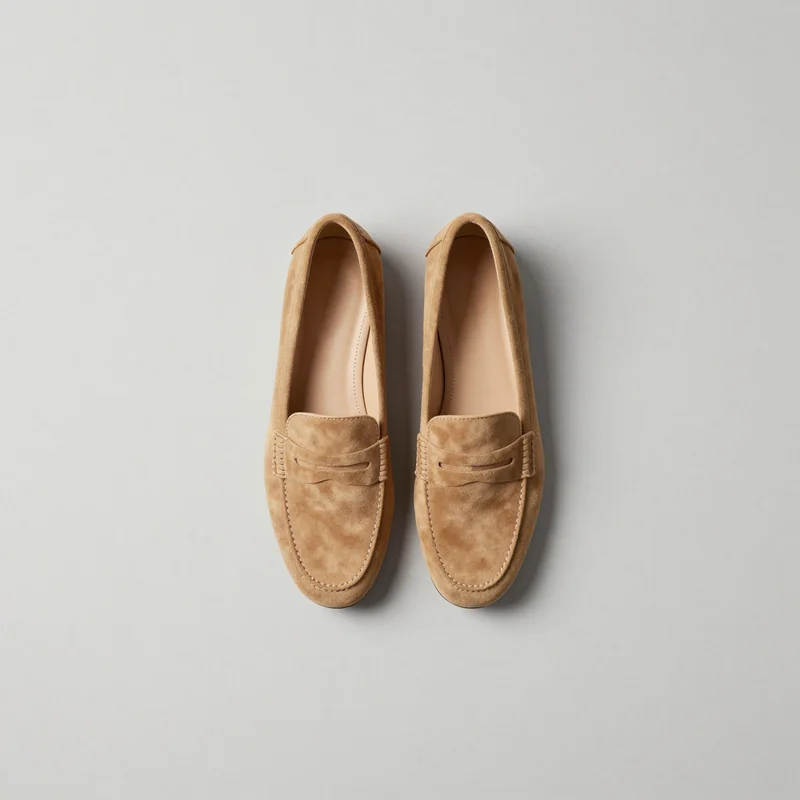 Tan flat loafers, illustration of this kind of item